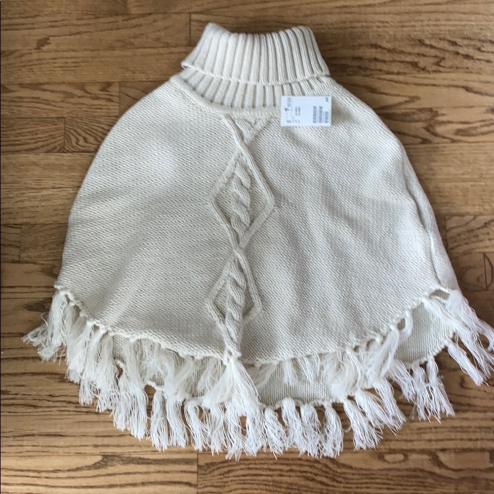 cream turtle neck shall